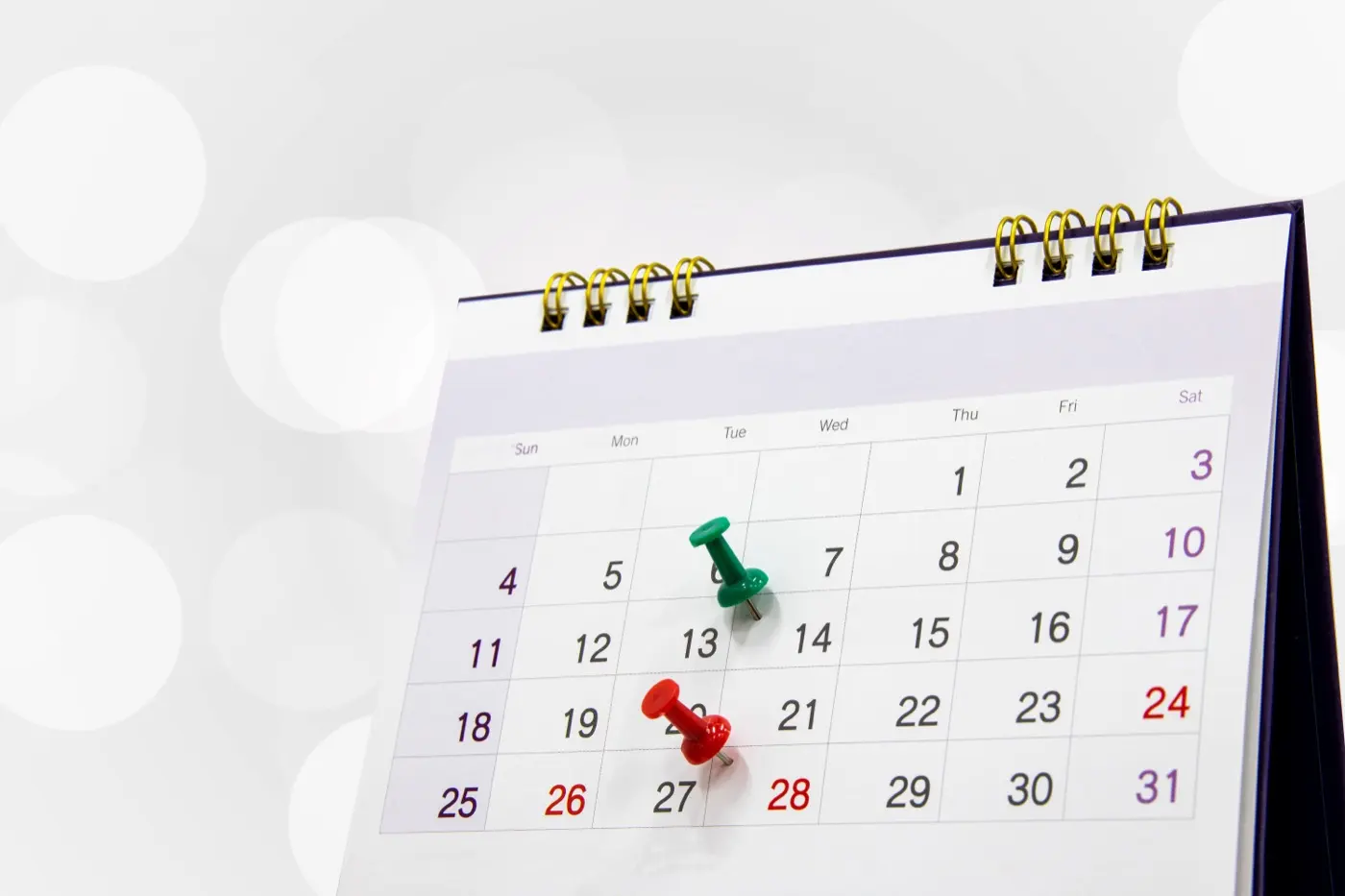 A desk calendar with pins marking dates, the fixed deadline for appointing a Corporate Service Provider