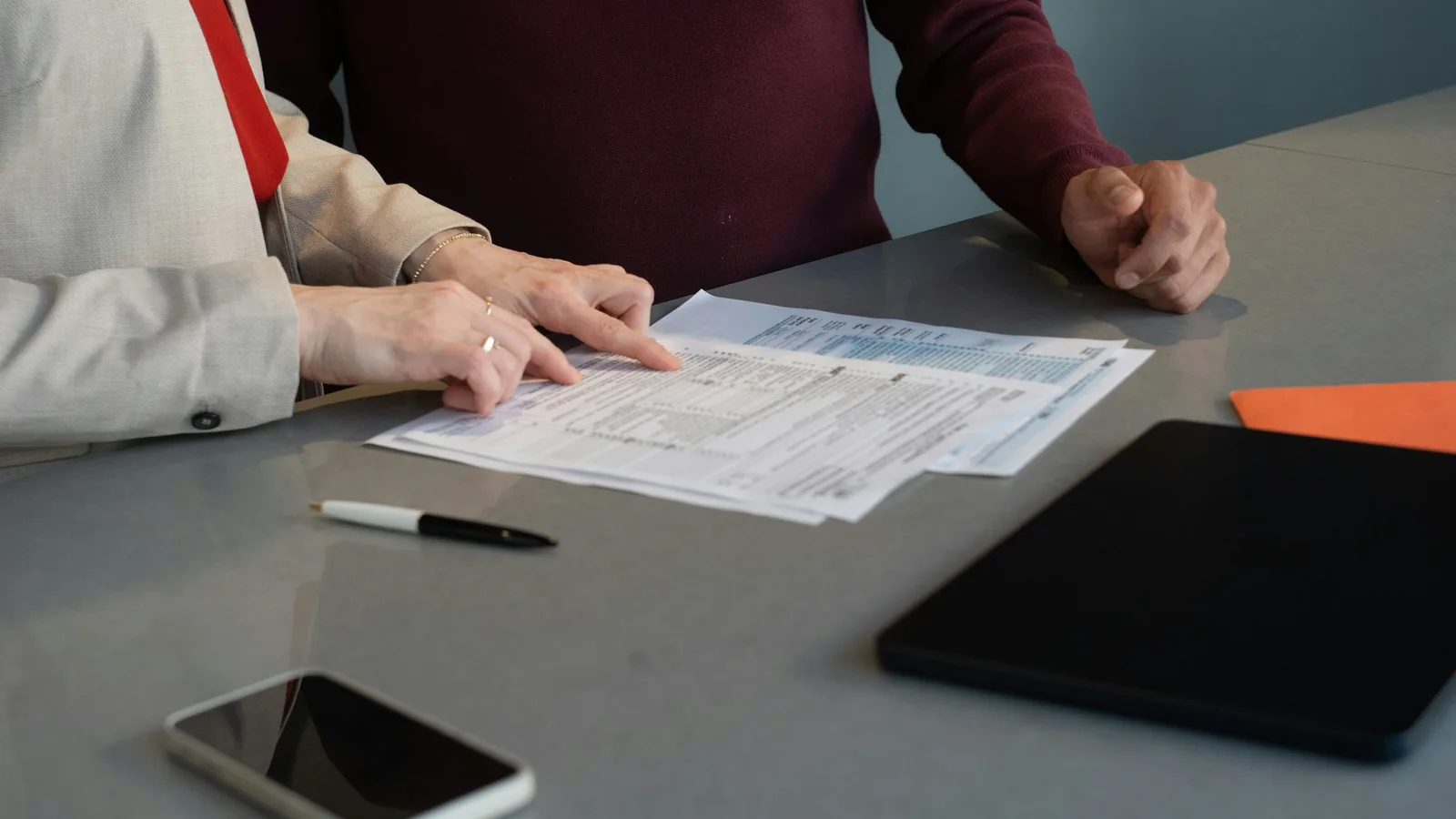 Printed rules worked through at a table, the 2026 DIFC fund regulations in practice