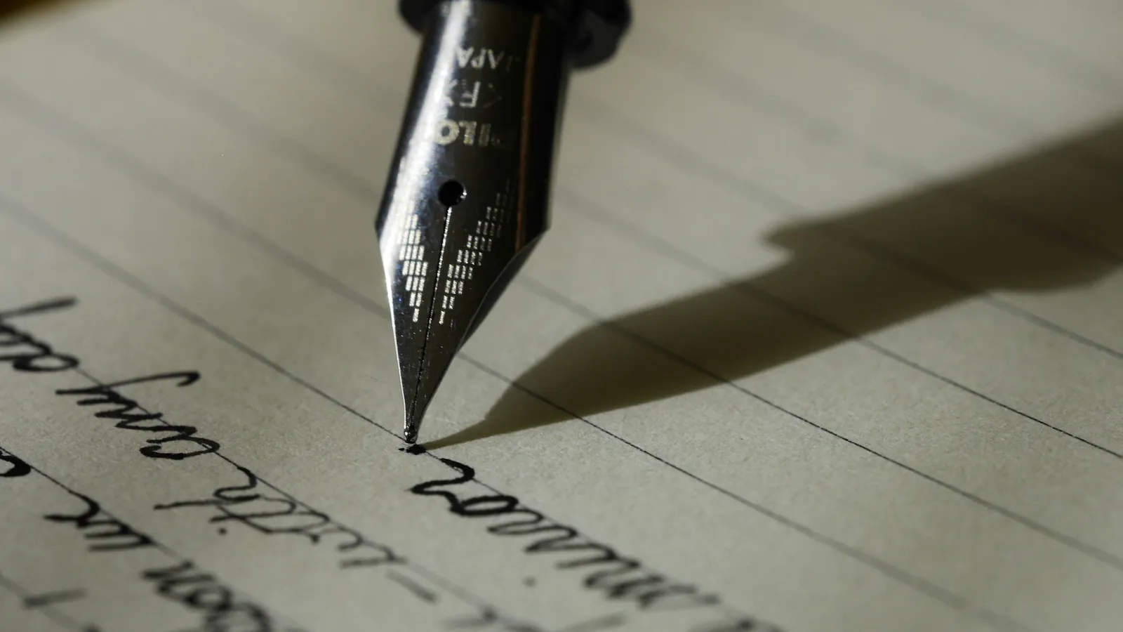A fountain pen signing a document, the will that decides what UAE default rules otherwise would