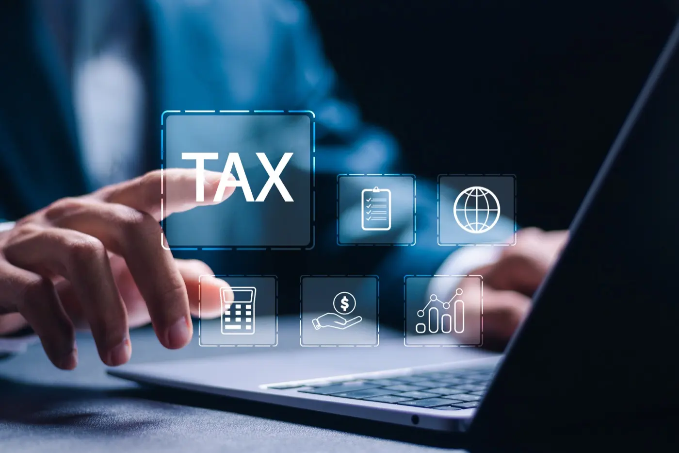 A laptop with tax icons overlaid, the VAT rules changing from 1 October 2026