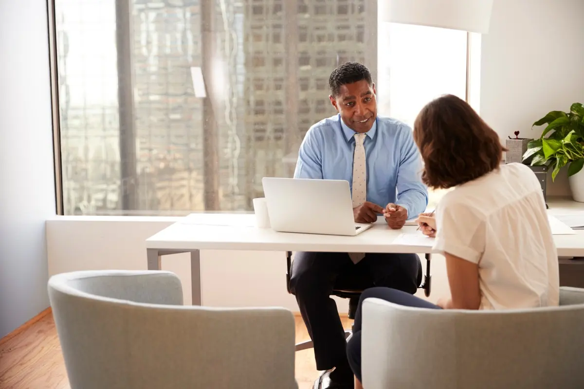 A client signing documents with an adviser, the shareholder resolution that approves a redomiciliation